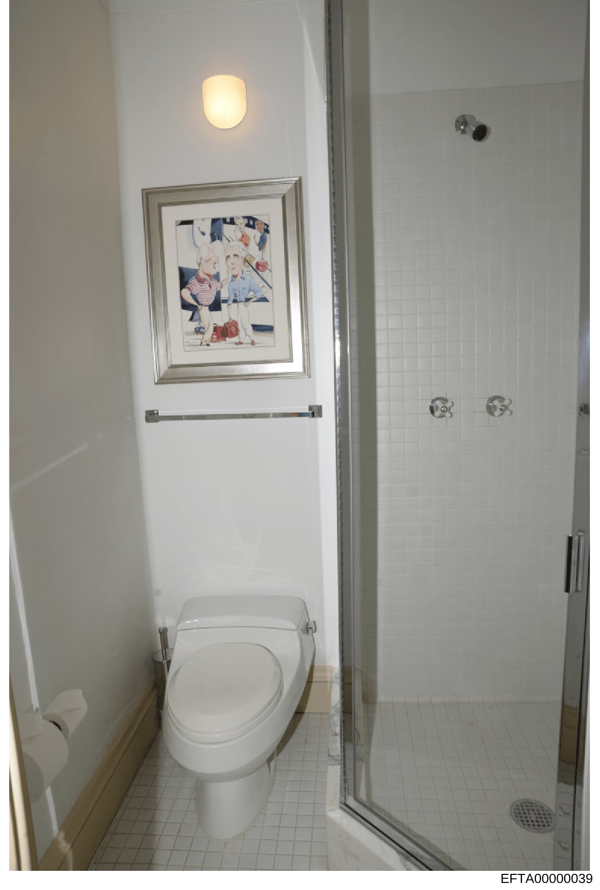 This is a photograph of a bathroom interior, likely from one of Jeffrey Epstein's properties. The image shows a clean, modern bathroom with white tiling, a toilet, walk-in shower with glass enclosure, wall-mounted fixtures, recessed lighting, and a f