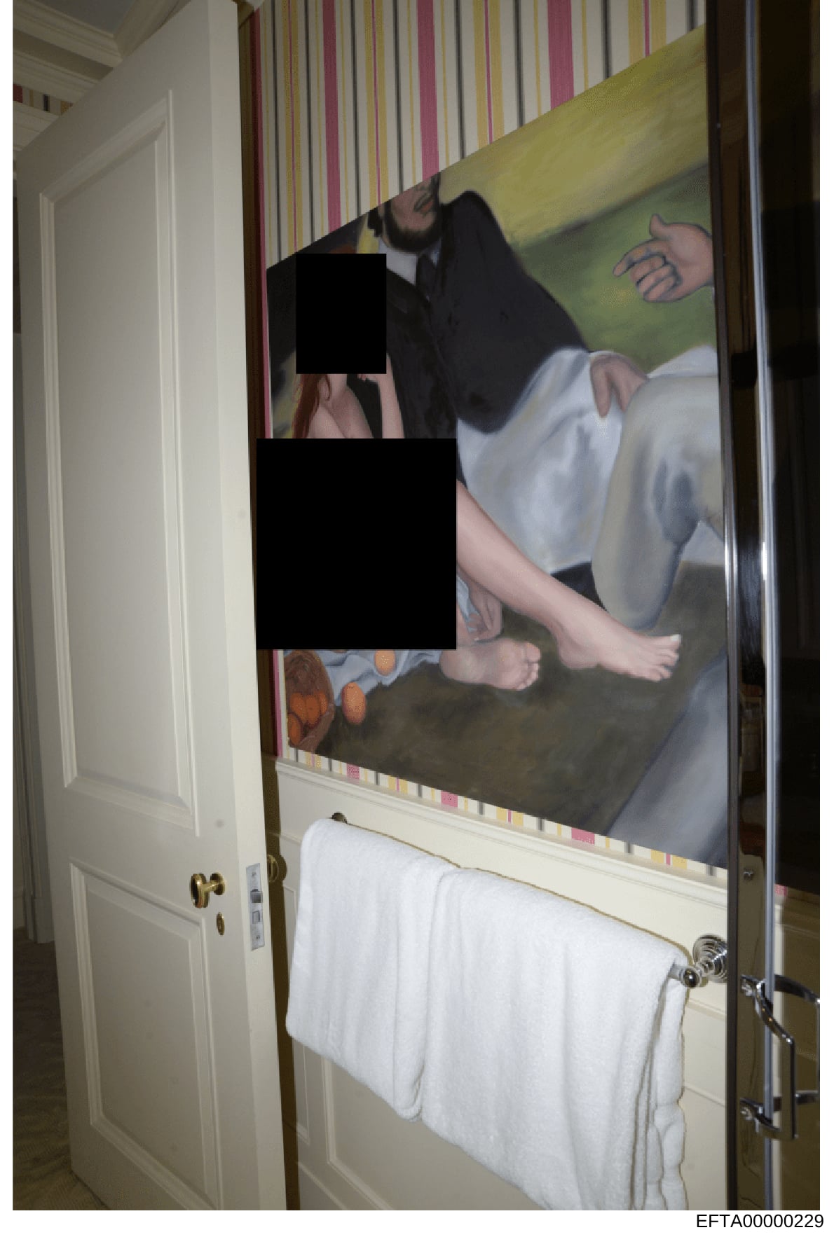 This is a photograph of a bathroom interior, likely from one of Epstein's properties, showing a mirror with striped wallpaper border, white towel rack, and a large painting or artwork depicting figures. Portions of the image have been redacted with b