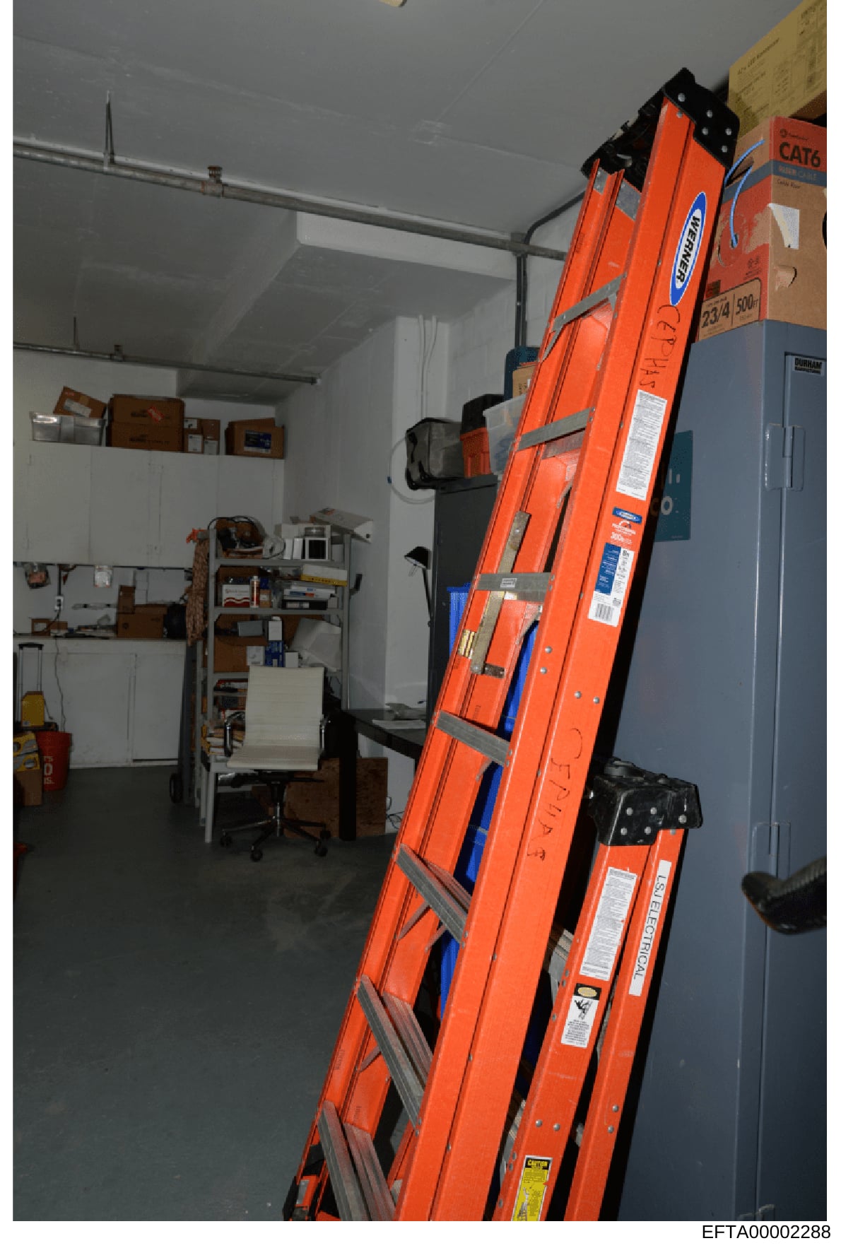 This is an evidence photograph showing the interior of a storage or utility space, featuring multiple orange extension ladders leaning against walls and various household items and equipment stored on shelves and the floor. The image documents the co
