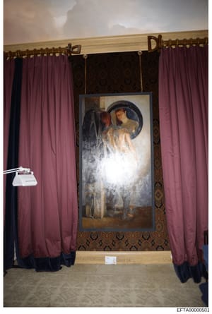 Photograph documenting an interior space, likely from one of Jeffrey Epstein's properties, showing a framed classical artwork depicting figures with a mirror or reflective element, flanked by burgundy and black curtains. The ornate wallpaper and wood