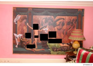 This photograph depicts an interior room with pink walls displaying a large classical or mythological artwork featuring multiple human figures. Several figures in the artwork have been redacted with black blocks. The room contains period furniture in