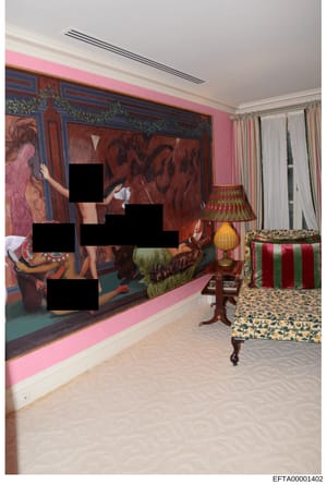This photograph documents an interior room containing a large, explicit erotic mural covering an entire wall. The room features pink walls, period furnishings including a striped chair and lamp, and appears to be part of a property under investigatio