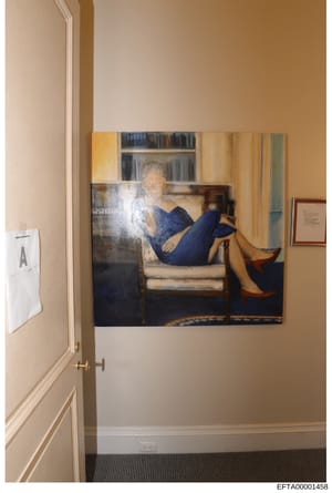 This is a photograph of a portrait painting displayed on a beige wall in what appears to be an interior room, likely from one of Epstein's properties. The painting depicts a figure in a blue dress reclining on a pale upholstered sofa or chair with bo