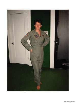 This is a personal photograph showing a woman wearing a U.S. Air Force flight suit with visible patches and insignia, photographed indoors against a green wall. The image appears to be documentary in nature and was included in the Epstein investigati