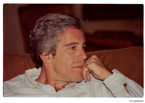 This is a color photograph showing a middle-aged man with gray hair in profile, wearing a light-colored button-up shirt, seated indoors against a brown/reddish background. The photo appears to be from investigative files and is catalogued with the Ba